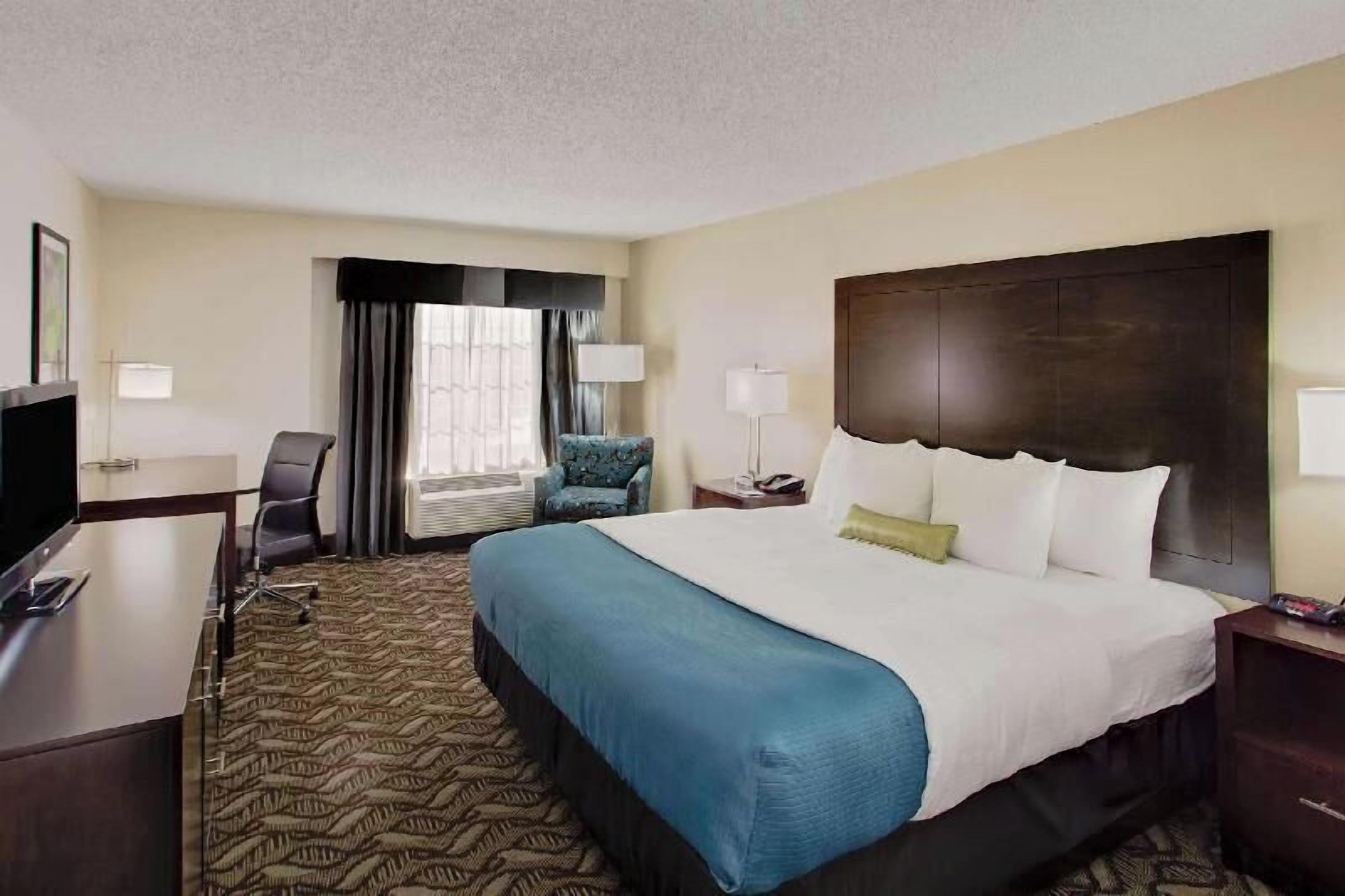 Premium bedding, desk, blackout curtains, iron/ironing board