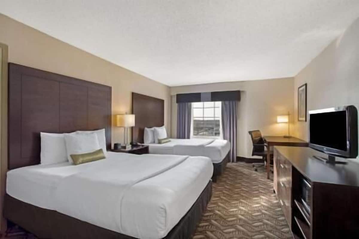 Premium bedding, desk, blackout curtains, iron/ironing board