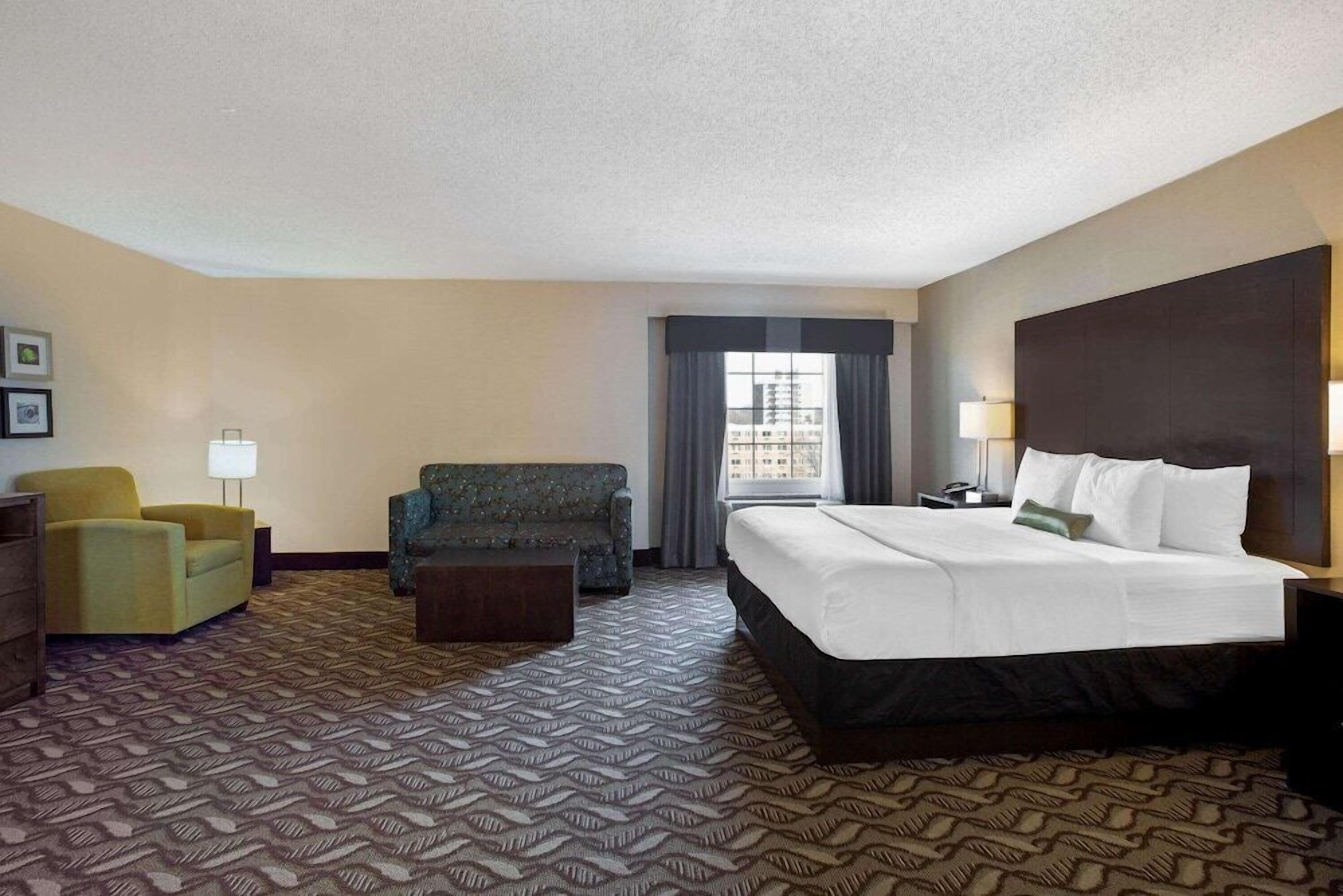 Premium bedding, desk, blackout curtains, iron/ironing board