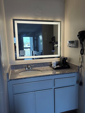 Combined shower/tub, deep soaking tub, free toiletries, hair dryer