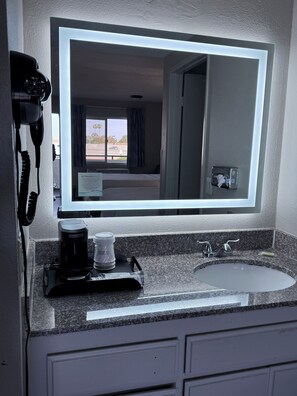 Combined shower/tub, deep soaking tub, free toiletries, hair dryer