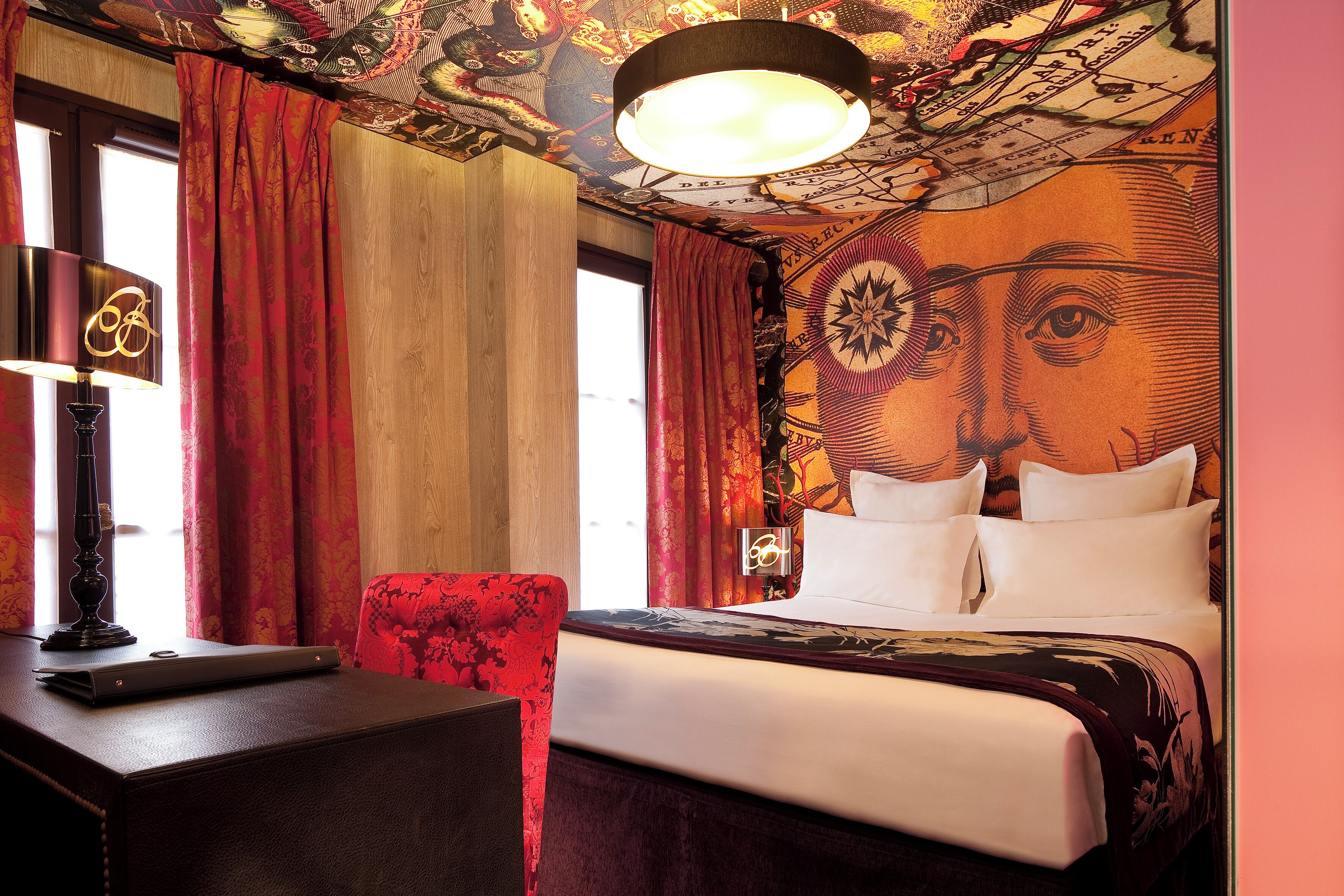 Minibar, in-room safe, individually decorated, desk