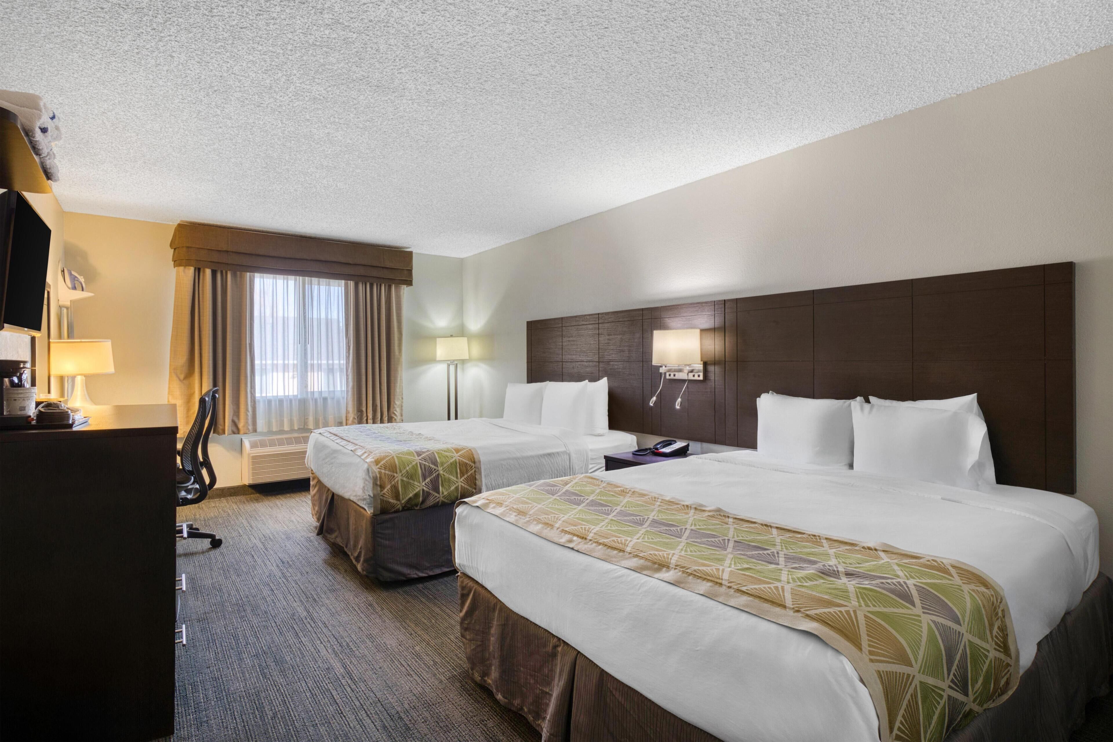 Individually furnished, desk, laptop workspace, blackout drapes