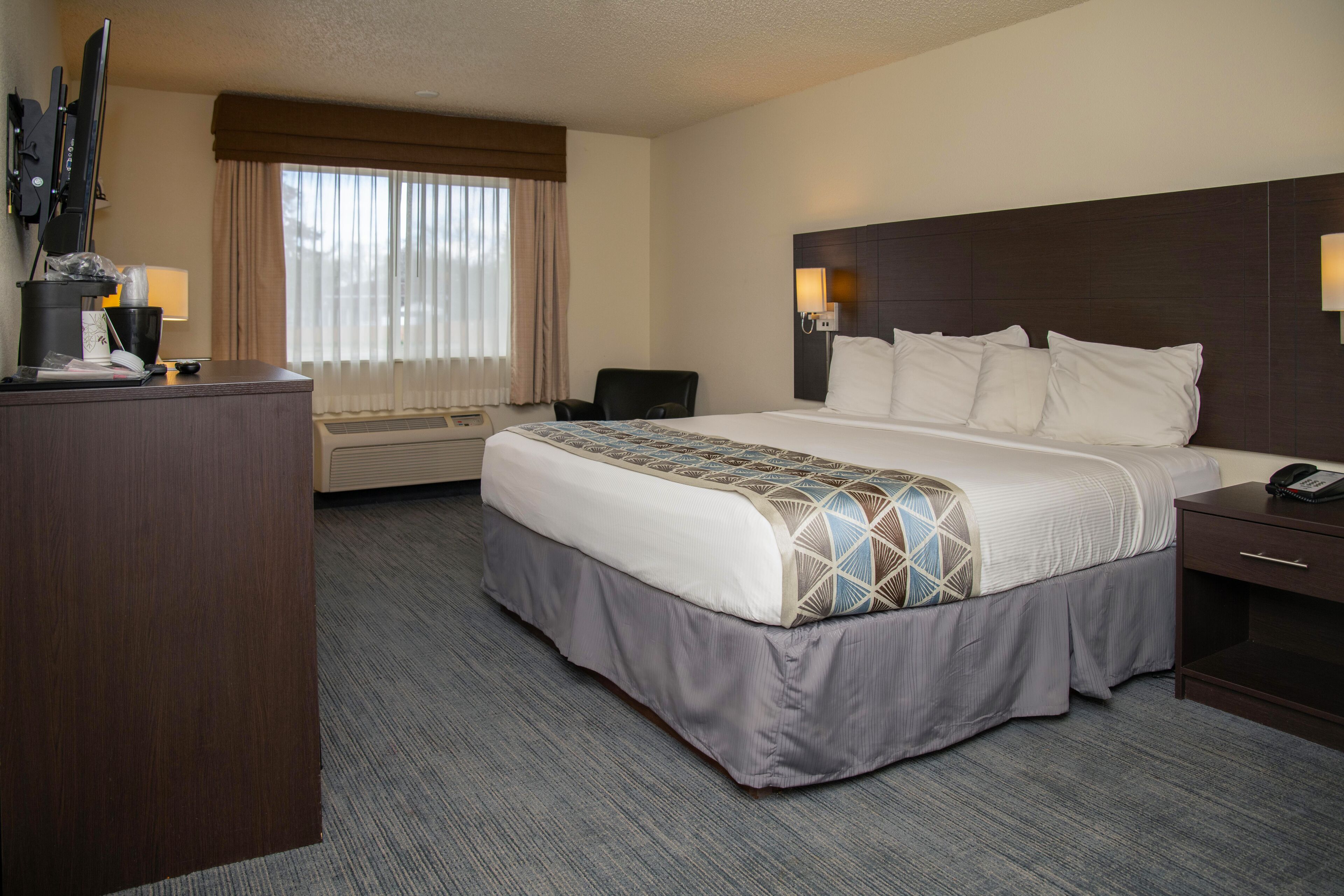 Individually furnished, desk, laptop workspace, blackout drapes