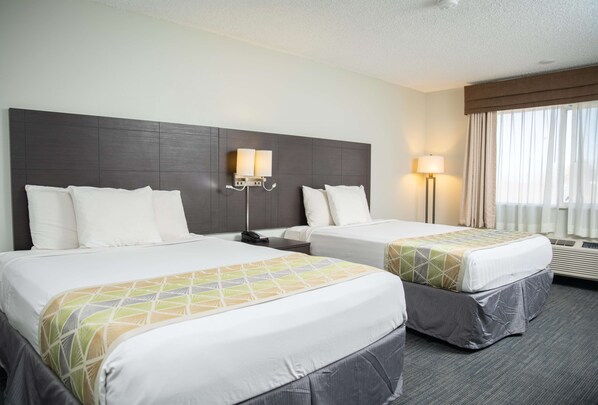 Standard Room, 2 Queen Beds, Non Smoking, Refrigerator & Microwave | Individually furnished, desk, laptop workspace, blackout drapes
