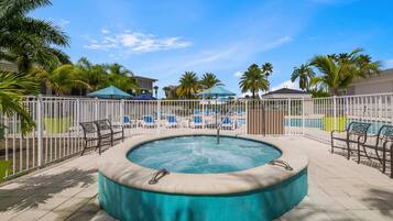 Outdoor pool, open 8:00 AM to 11:00 PM, pool umbrellas, sun loungers