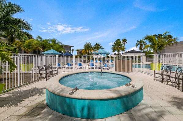Outdoor pool, open 8:00 AM to 11:00 PM, pool umbrellas, pool loungers