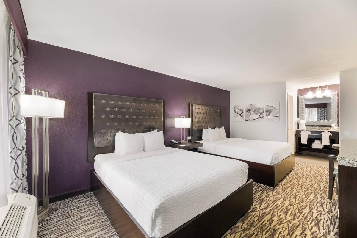 Premium bedding, pillow-top beds, in-room safe, blackout curtains