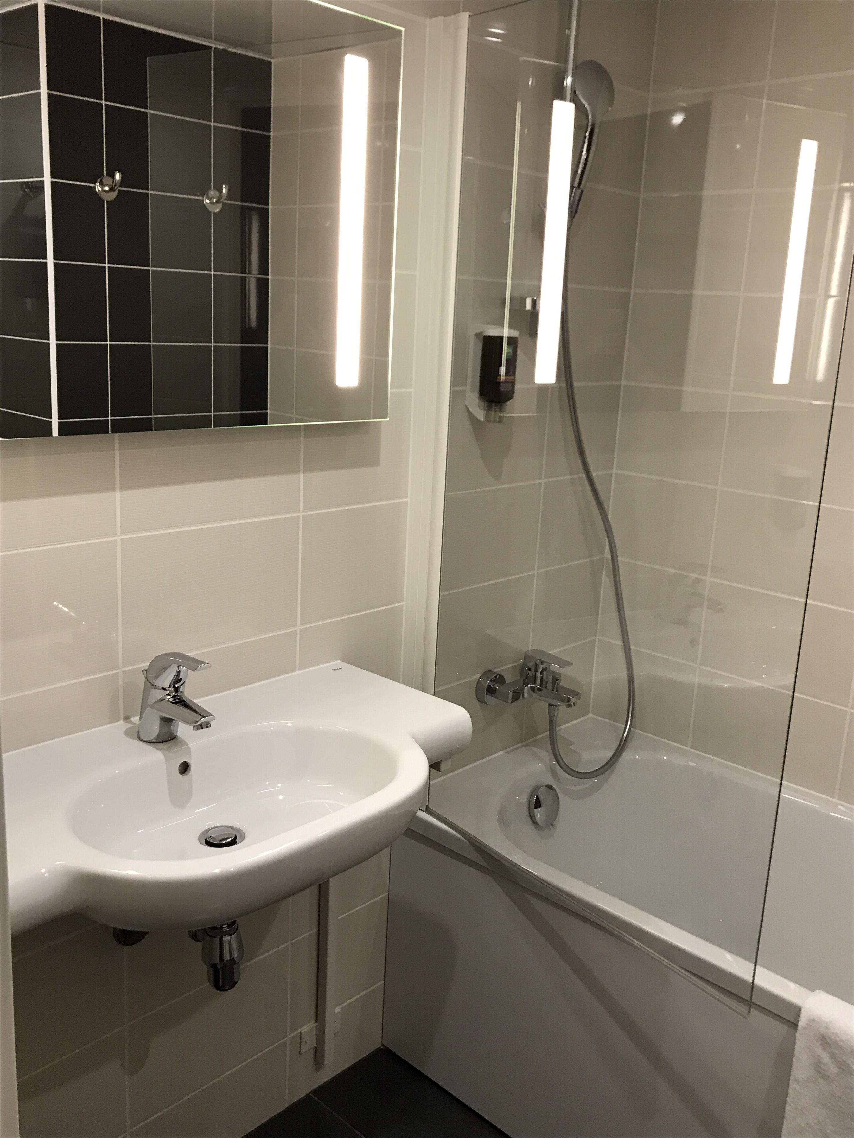 eco-friendly toiletries, hair dryer, towels