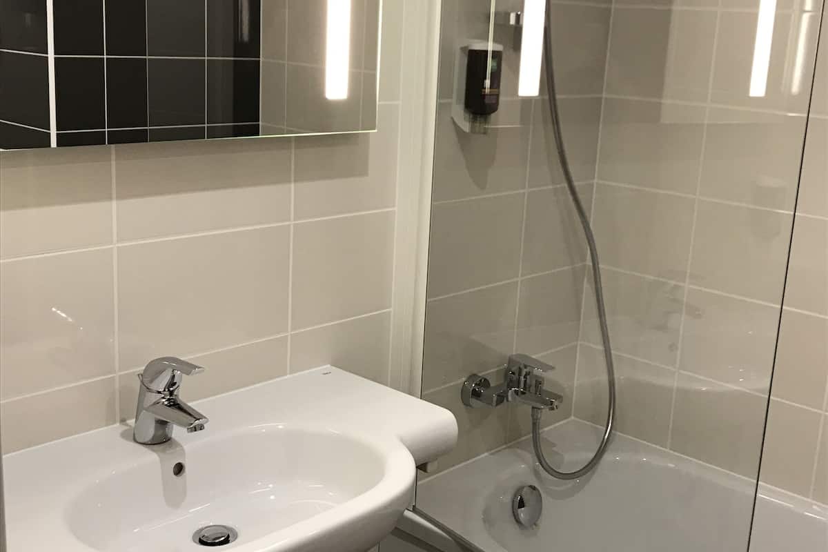 eco-friendly toiletries, hair dryer, towels