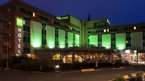 A hotel with a modern design, featuring a prominent 'HOTEL' sign and 'ibis Styles' branding. - ibis Styles Paris Roissy CDG (Roissy-en-France)