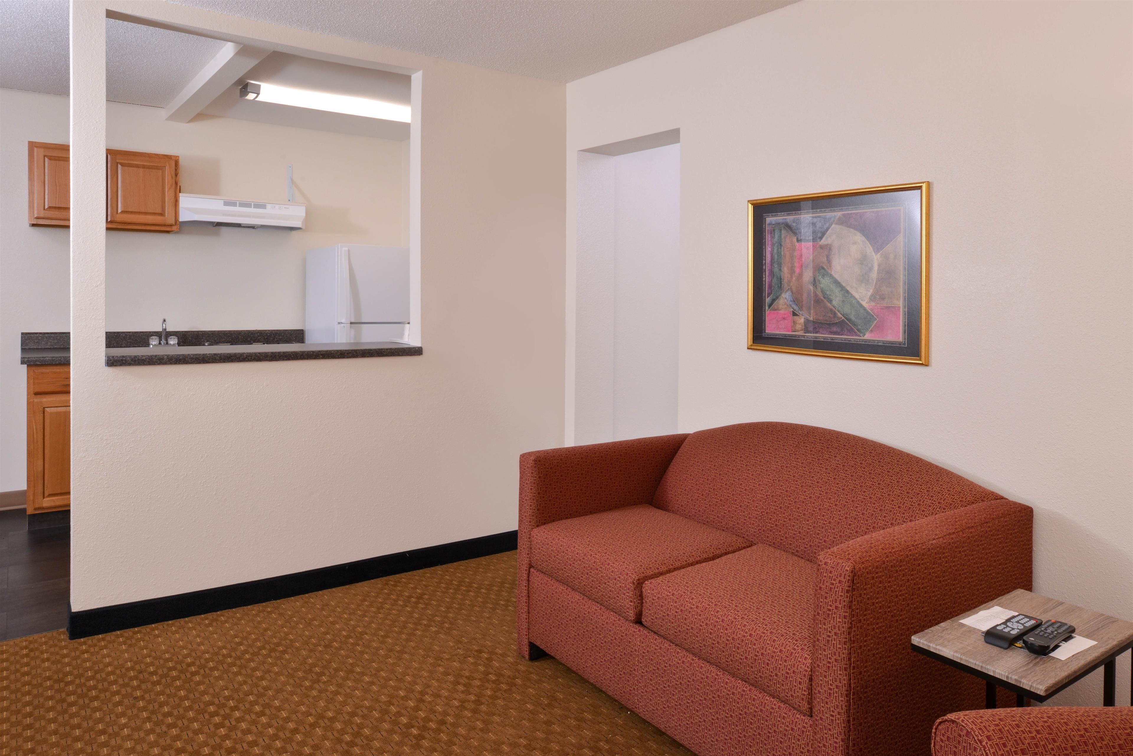 suite, 1 queen bed, non smoking | in-room safe, desk, free wifi, bed sheets