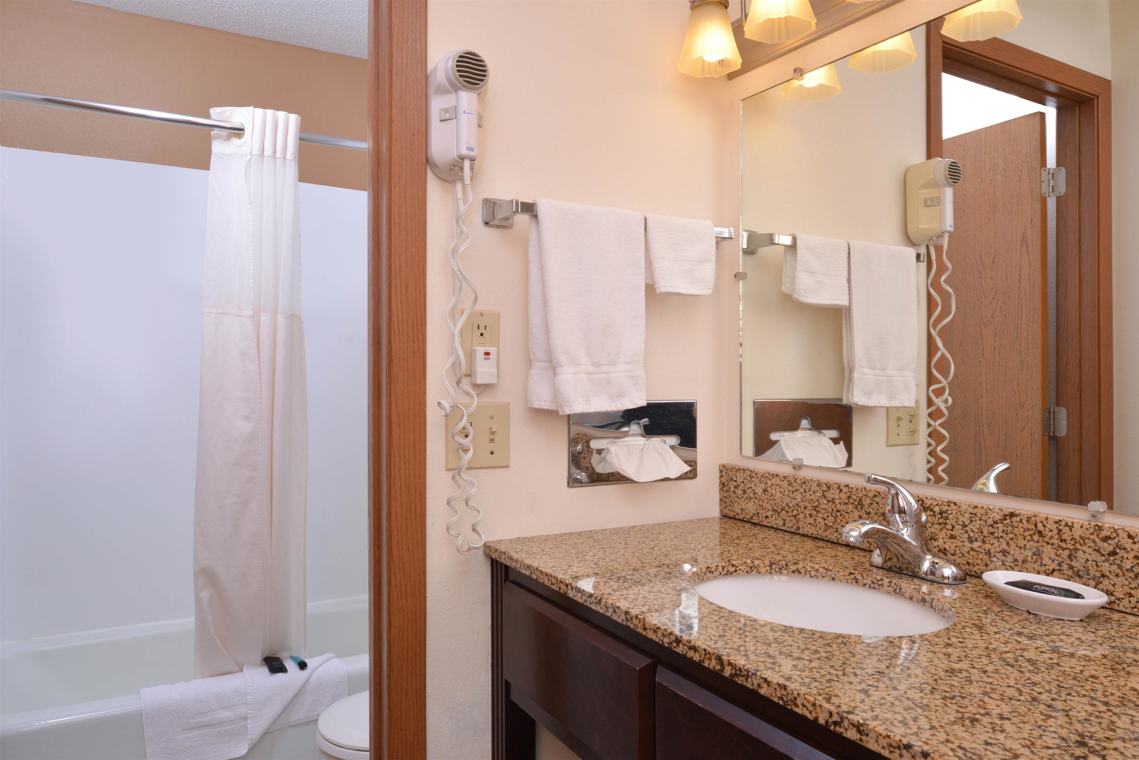 room, 2 queen beds, non smoking | bathroom | free toiletries, hair dryer, towels, soap