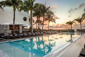 Outdoor pool, pool umbrellas, sun loungers