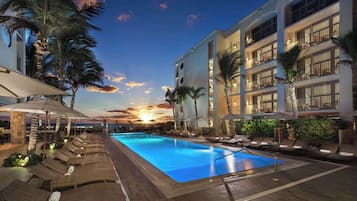 Outdoor pool, pool umbrellas, pool loungers