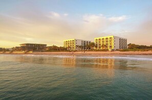 A beachfront hotel with multiple buildings, a sandy beach, and the ocean. - Costa d'Este Beach Resort and Spa (Vero Beach)
