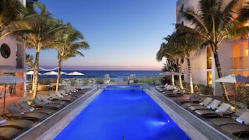 Outdoor pool, pool umbrellas, sun loungers