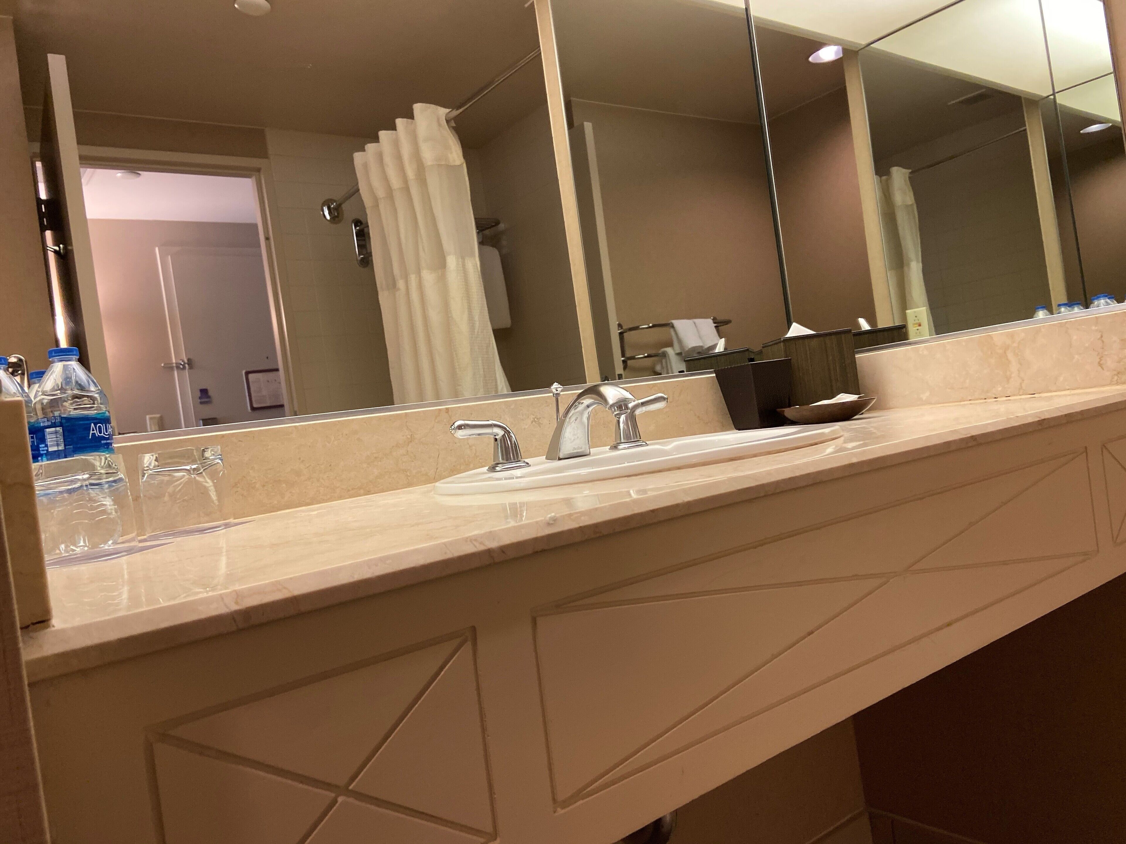 combined shower/bathtub, eco-friendly toiletries, hair dryer, towels