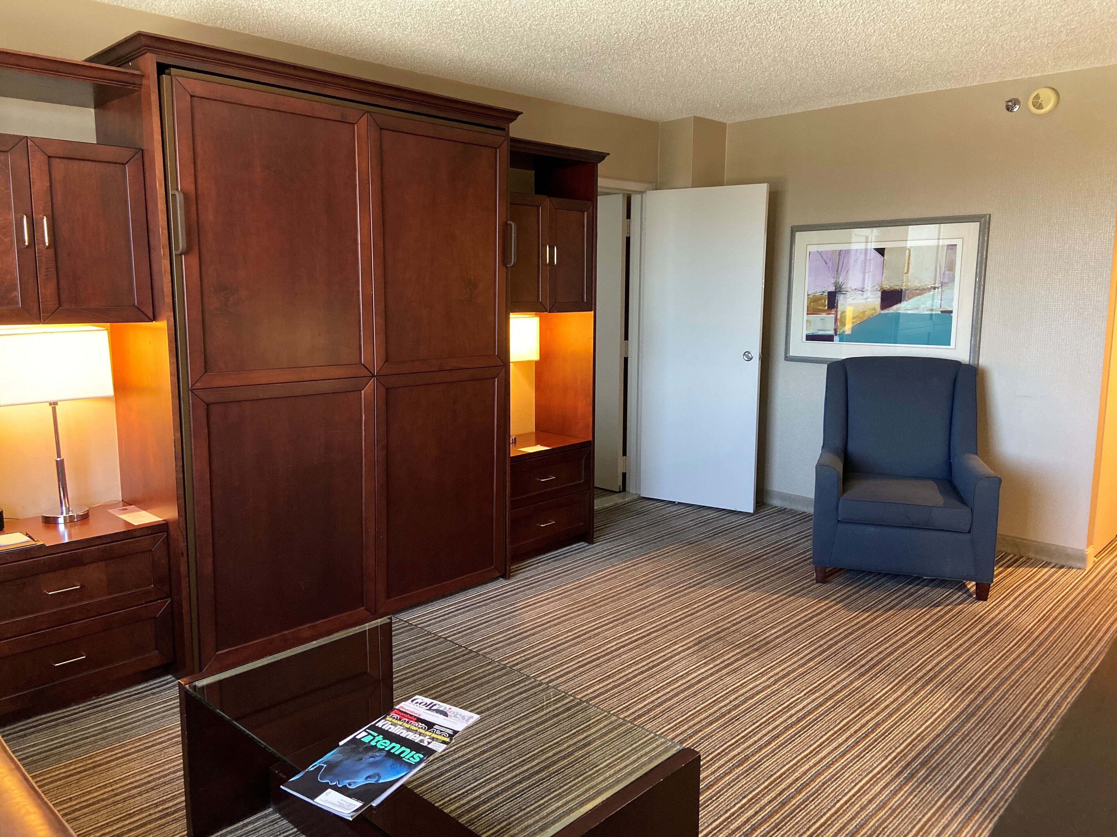 junior suite | living area | 43-inch flat-screen tv with cable channels, tv