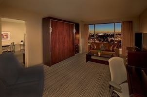 Junior Suite | Living room | 43-inch flat-screen TV with cable channels, TV