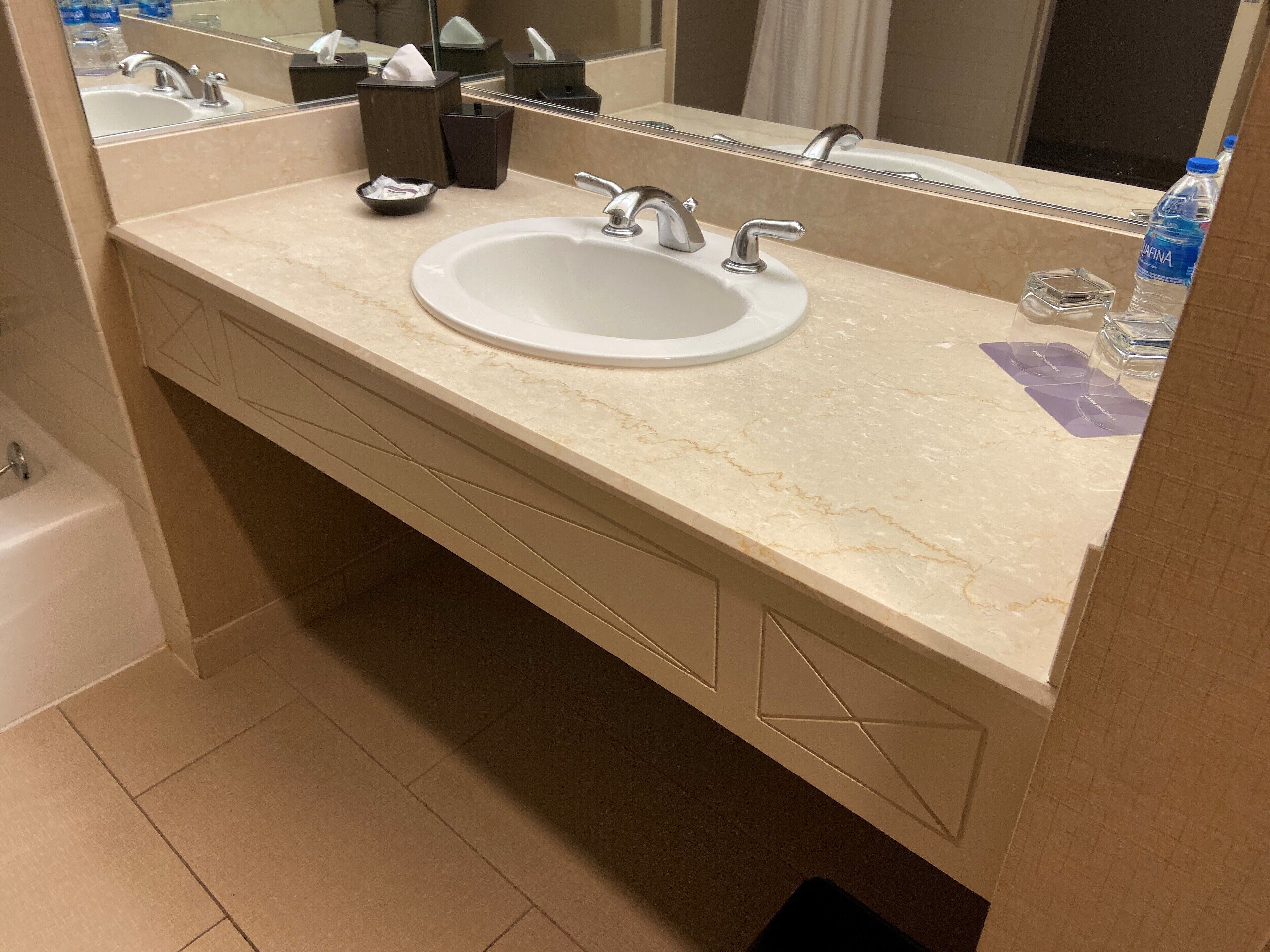 combined shower/bathtub, eco-friendly toiletries, hair dryer, towels