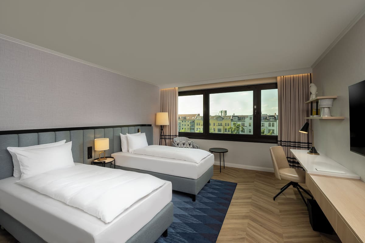 Quarto executivo, 2 camas de solteiro | 1 quarto, roupas de cama antialérgicas, frigobar, cofres nos quartos