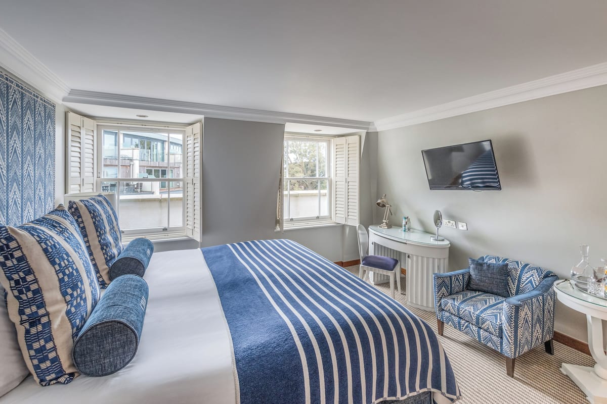 In-room safe, desk, blackout curtains, iron/ironing board