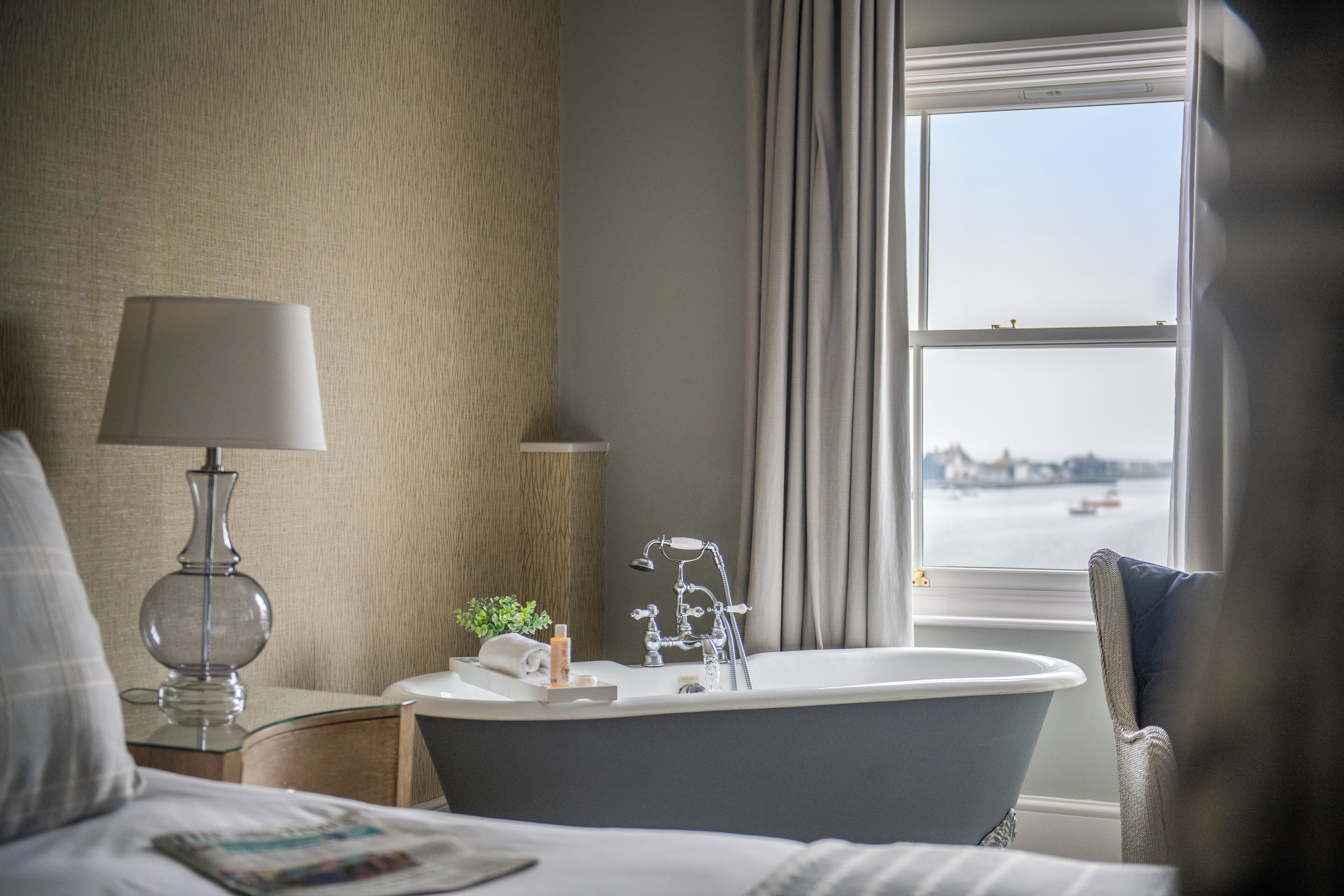 deluxe double room, harbour view | in-room safe, desk, blackout curtains, iron/ironing board