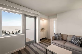 Suite, Multiple Beds, Terrace | Living area | 42-inch flat-screen TV with cable channels, TV, MP3 dock at Hilton Cabana Miami Beach Resort