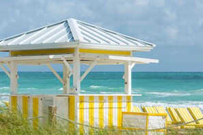 Private beach, white sand, sun-loungers, beach umbrellas