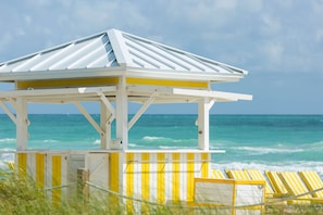 Private beach, white sand, sun-loungers, beach umbrellas