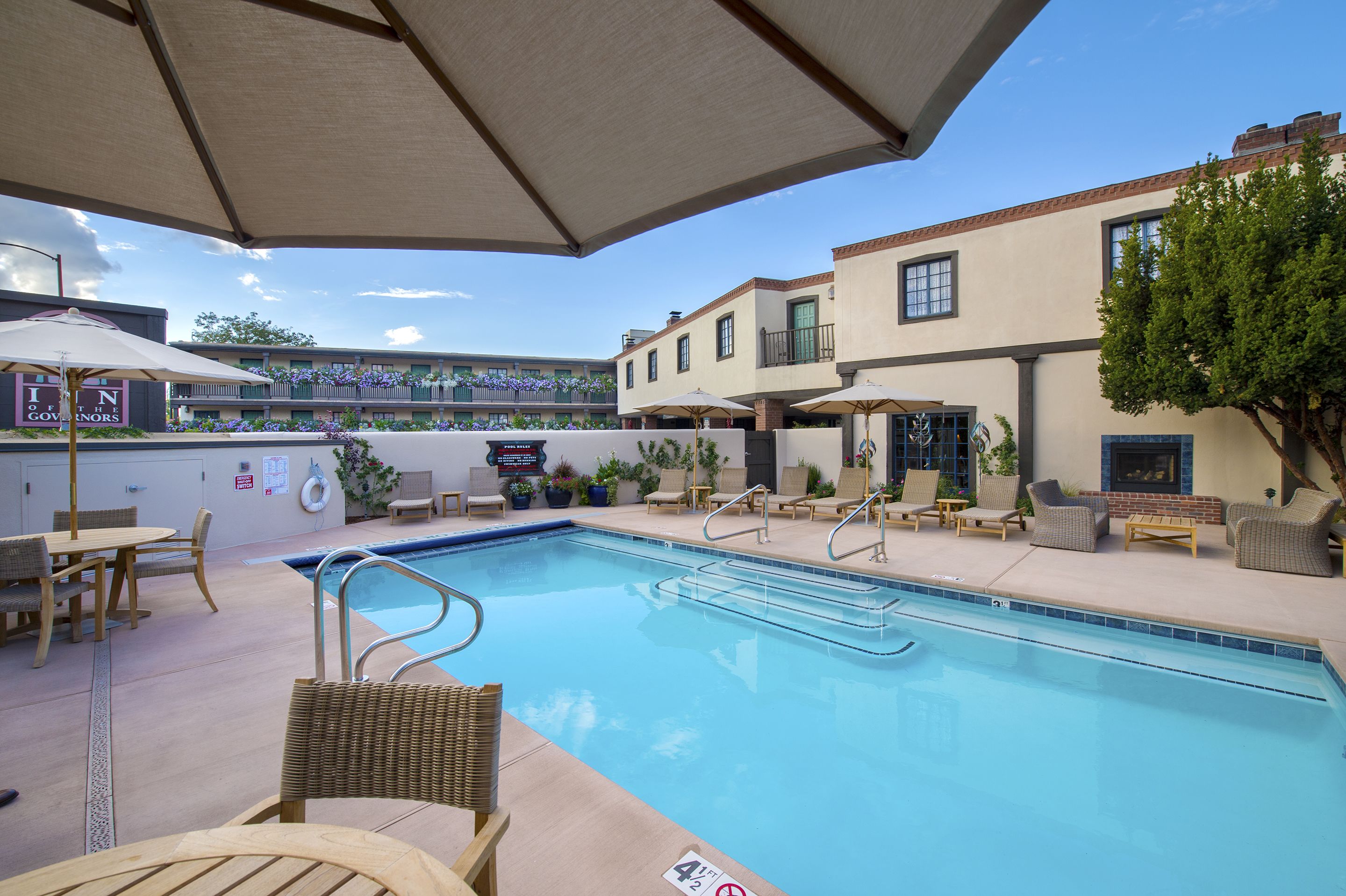 outdoor pool, a heated pool, pool loungers