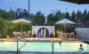 Outdoor pool, a heated pool, pool loungers