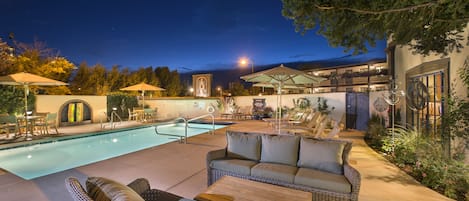 Outdoor pool, a heated pool, sun loungers