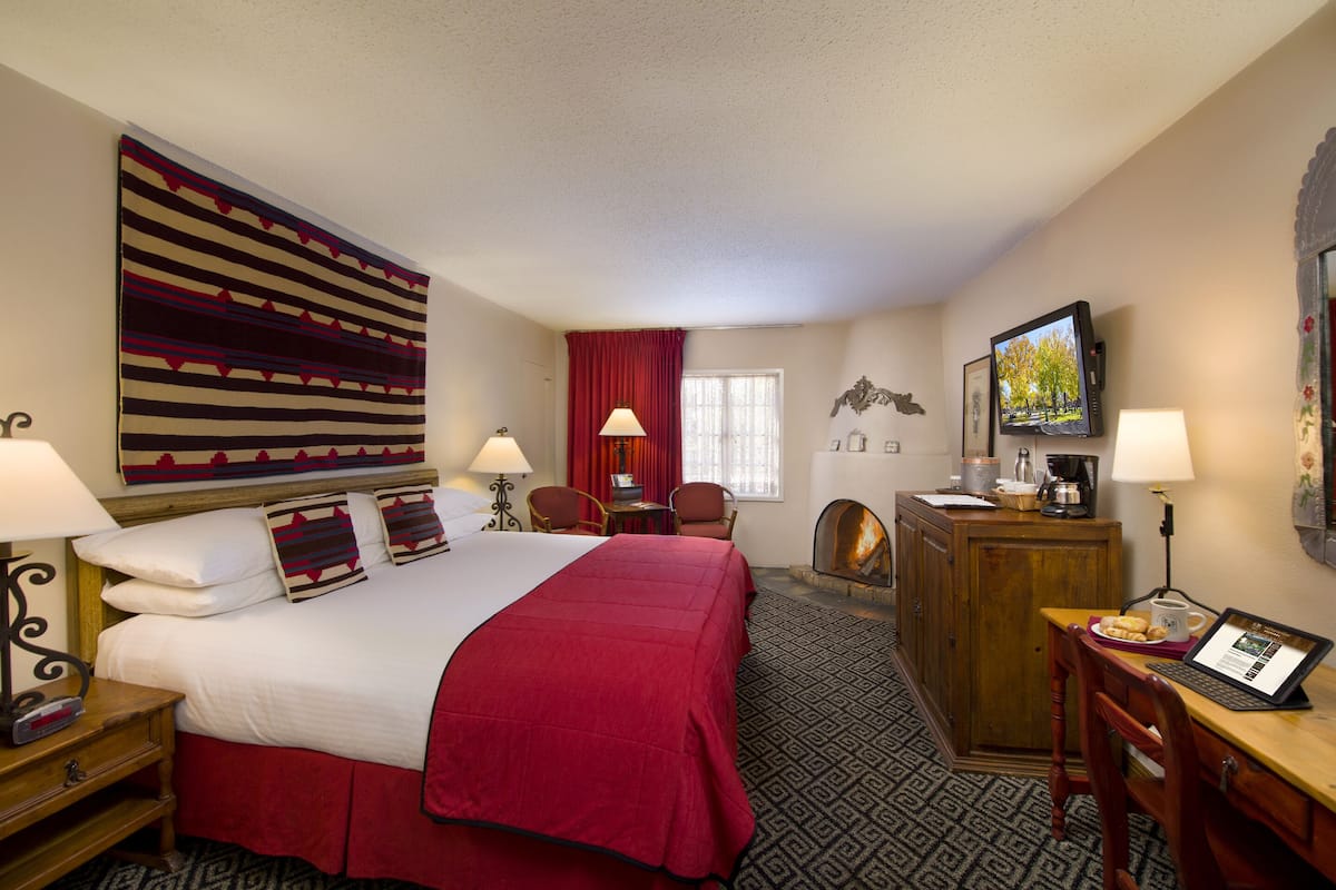 superior room, 1 king bed, fireplace | 1 bedroom, premium bedding, pillow-top beds, in-room safe