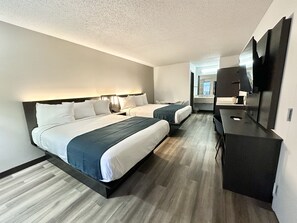 Desk, laptop workspace, blackout curtains, bed sheets