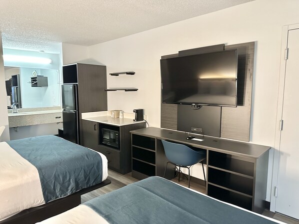 Desk, laptop workspace, blackout curtains, bed sheets