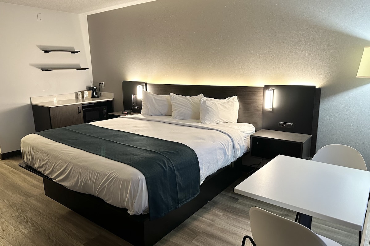 desk, blackout curtains, bed sheets, alarm clocks