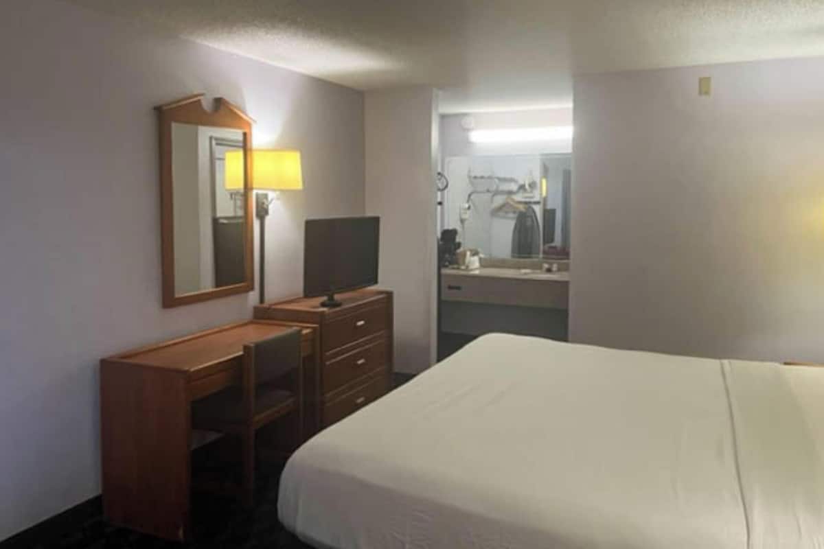 desk, blackout curtains, bed sheets, alarm clocks