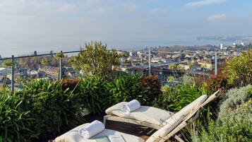 Premium bedding, down comforters, minibar, in-room safe