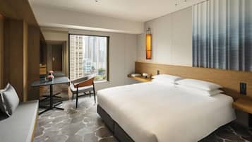 Deluxe Room, 1 King Bed, City View | In-room safe, desk, blackout drapes, iron/ironing board