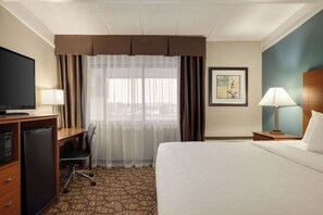Room, 1 King Bed, Non Smoking | In-room safe, desk, blackout drapes, iron/ironing board