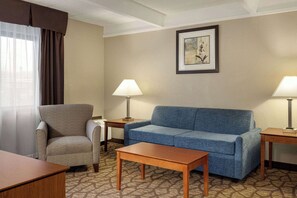 Suite, 1 King Bed with Sofa bed, Non Smoking | In-room safe, desk, blackout drapes, iron/ironing board - AmericInn by Wyndham Grand Rapids Airport North (Grand Rapids)
