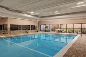 Indoor pool, open 8:00 AM to 11:00 PM, pool loungers