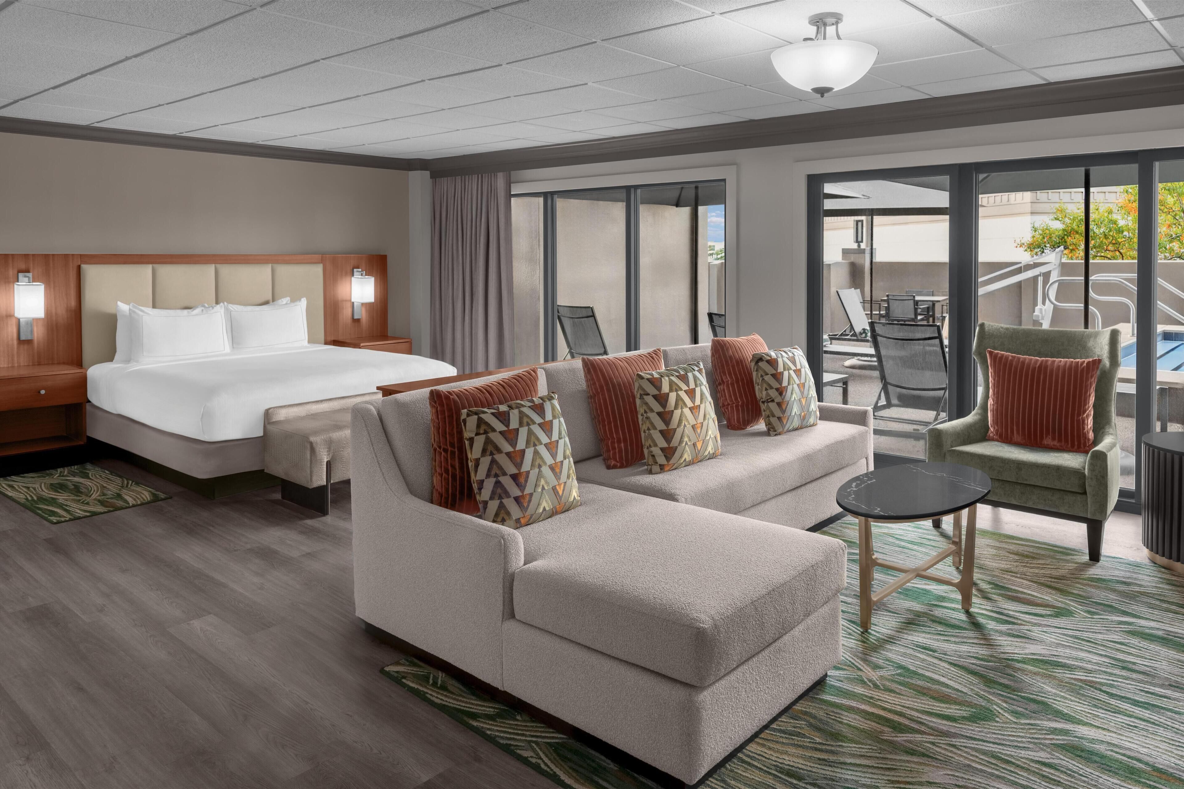 Junior Suite, 1 King Bed, Pool View (Oversized) | Living area