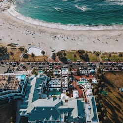 On the beach, white sand, beach towels, beach bar
