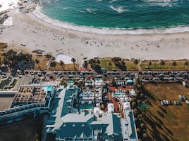 On the beach, white sand, beach towels, beach bar