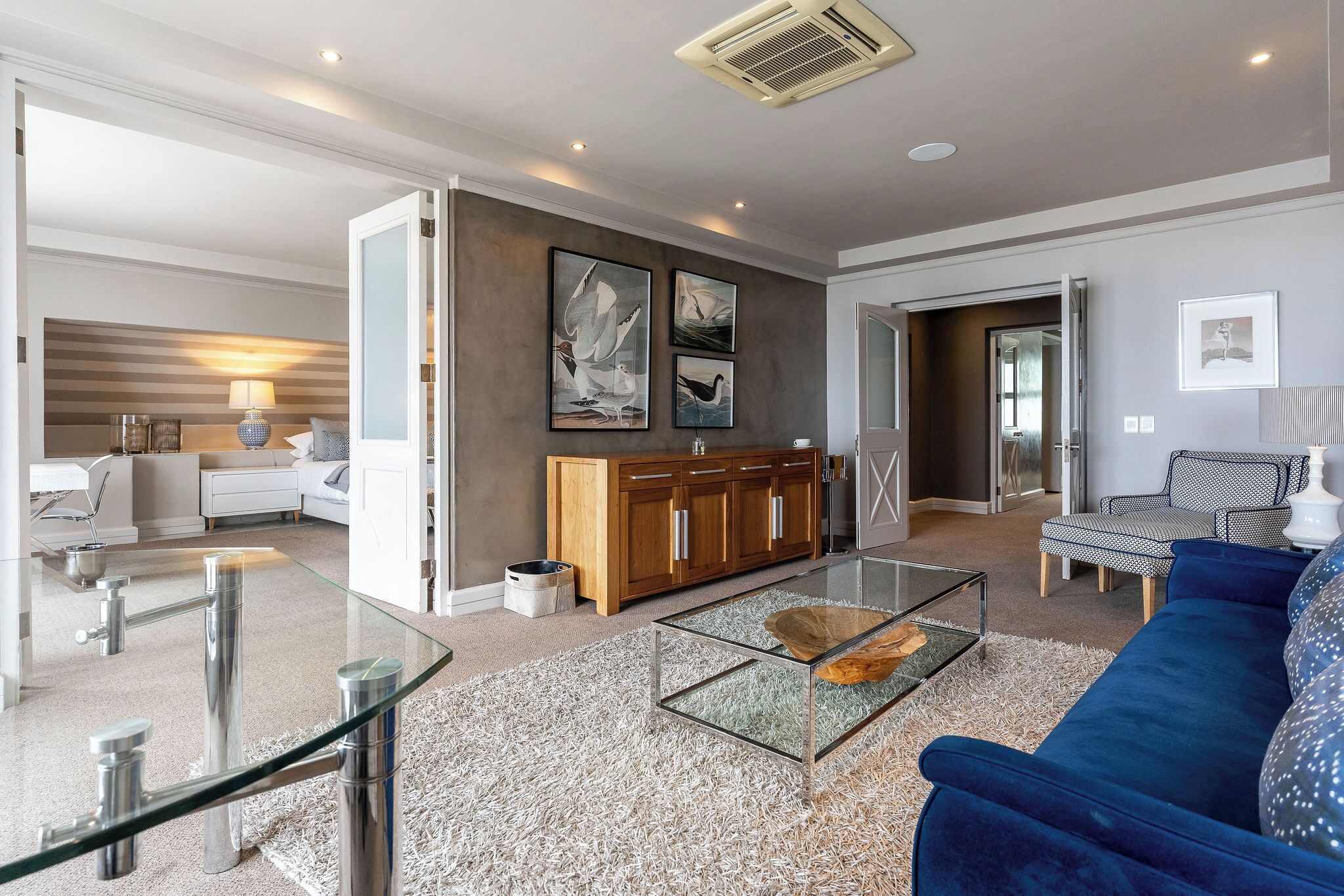 sky penthouse | living area | 42-inch smart tv with satellite channels, tv, netflix