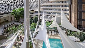 Indoor pool, open 7:00 AM to 10:00 PM, sun loungers