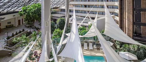 Indoor pool, open 7:00 AM to 10:00 PM, sun loungers